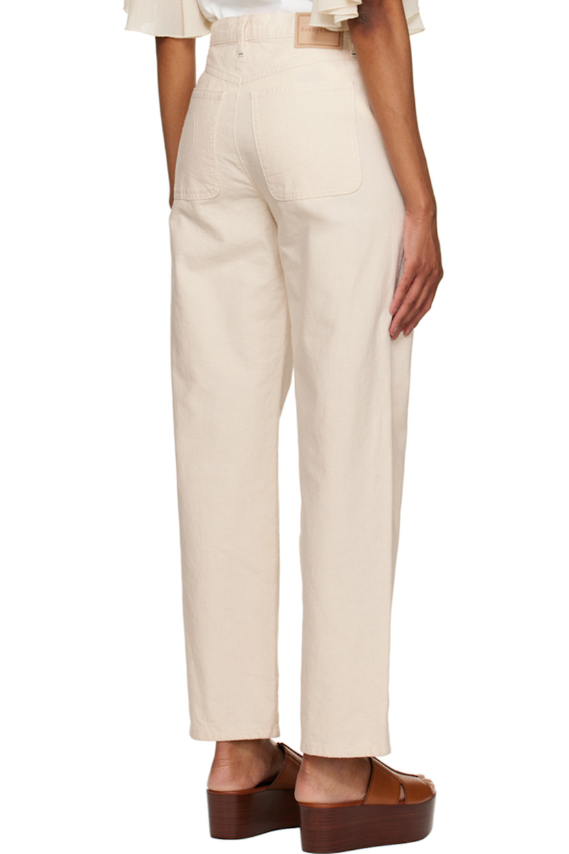 Non-stretch denim jeans.

· Belt loops
· Four-pocket styling
· Pleat detailing at front
· Zip-fly

Supplier color: Antique white