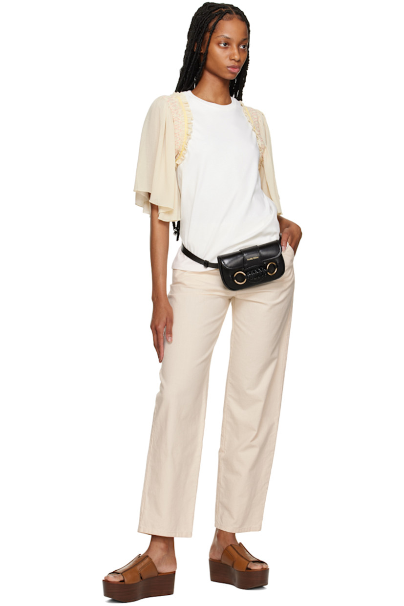 Non-stretch denim jeans.

· Belt loops
· Four-pocket styling
· Pleat detailing at front
· Zip-fly

Supplier color: Antique white