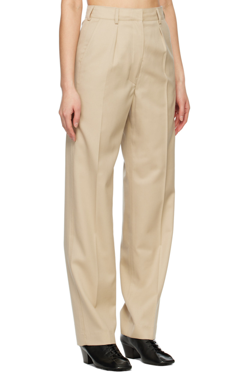 Relaxed-fit straight-leg wool twill trousers. 

· Belt loops
· Four-pocket styling
· Zip-fly
· Creased legs

Supplier color: Beige