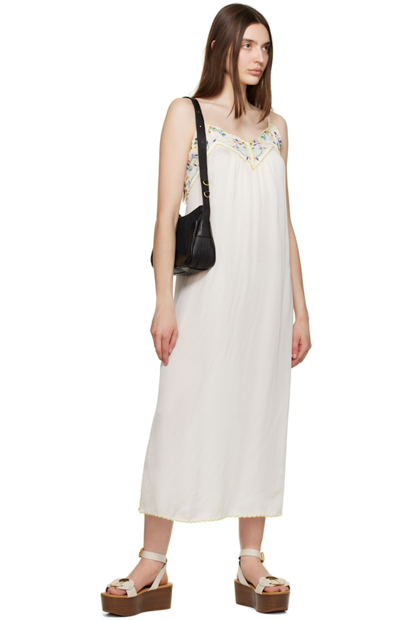 Grained calfskin sandals in white. 

· Open round toe
· Logo-engraved hardware at vamp
· Pin-buckle fastening at ankle strap
· Logo-embossed leather footbed
· Wooden platform midsole and wedge heel
· Rubber outsole 
· Platform: H2.5"

Supplier color: Natural