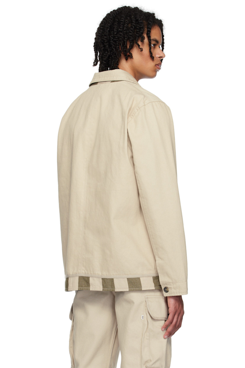 Cotton twill jacket. 

· Spread collar 
· Button closure 
· Welt and flap pockets 
· Logo flag at side seam
· Single-button barrel cuffs 
· Stripes at back hem 
· Patch pockets at interior 
· Partial plain-woven cotton lining 

Supplier color: Warm grey