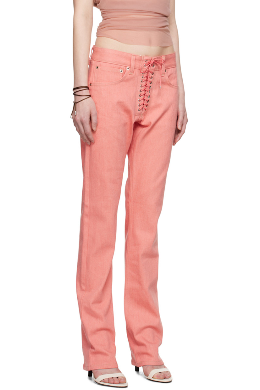 Non-stretch denim jeans. Eyelets throughout. 

· Belt loops 
· Five-pocket styling 
· Lace-up closure
· Embroidered logo patch at back waistband 
· Contrast stitching in tan 

Supplier color: Pink