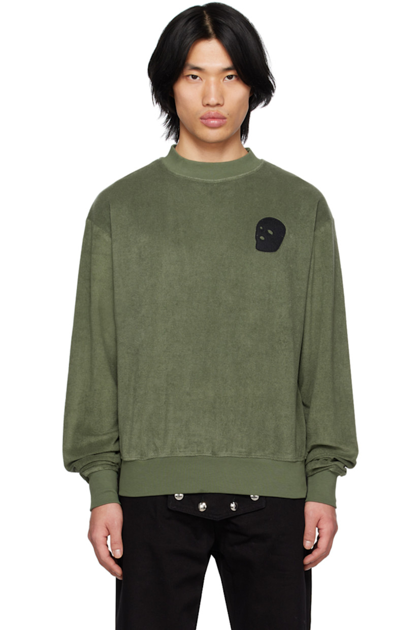 Cotton terrycloth sweatshirt.

· Rib knit crewneck, hem, and cuffs
· Felted logo patch at chest 

Supplier color: Green