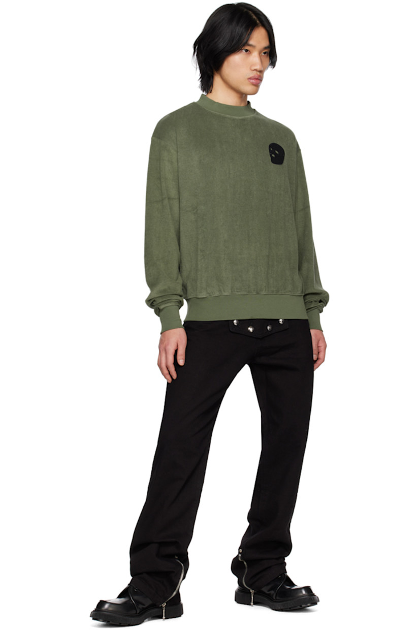Cotton terrycloth sweatshirt.

· Rib knit crewneck, hem, and cuffs
· Felted logo patch at chest 

Supplier color: Green