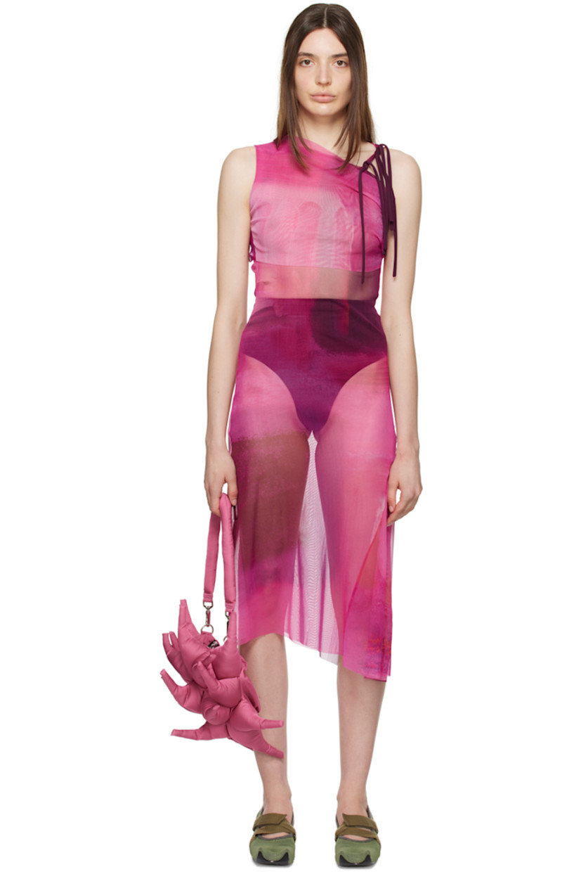 Semi-sheer nylon mesh dress. Raw edges and graphic pattern printed throughout.

· Layered construction
· Asymmetric neck and hem
· Gathering at side seams
· Knotted accents at shoulder strap
· Cutout at back
· Unlined 

Supplier color: Fuchsia