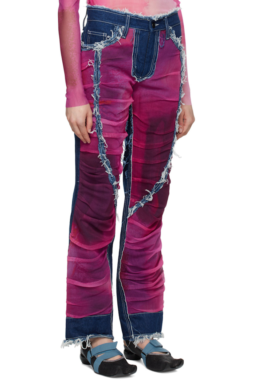 Paneled non-stretch denim jeans. Gathering, and frayed edges, and nylon mesh trim throughout. 

· Layered construction
· Belt loops
· Five-pocket styling
· Zip-fly
· Logo patch at back waistband
· Contrast stitching in white

Supplier color: Blue/Fuchsia