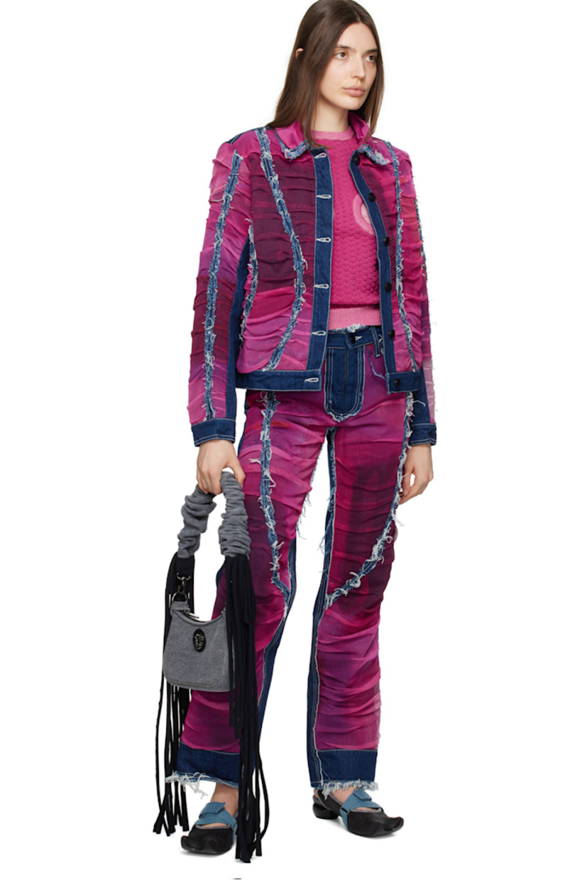 Paneled non-stretch denim jeans. Gathering, and frayed edges, and nylon mesh trim throughout. 

· Layered construction
· Belt loops
· Five-pocket styling
· Zip-fly
· Logo patch at back waistband
· Contrast stitching in white

Supplier color: Blue/Fuchsia