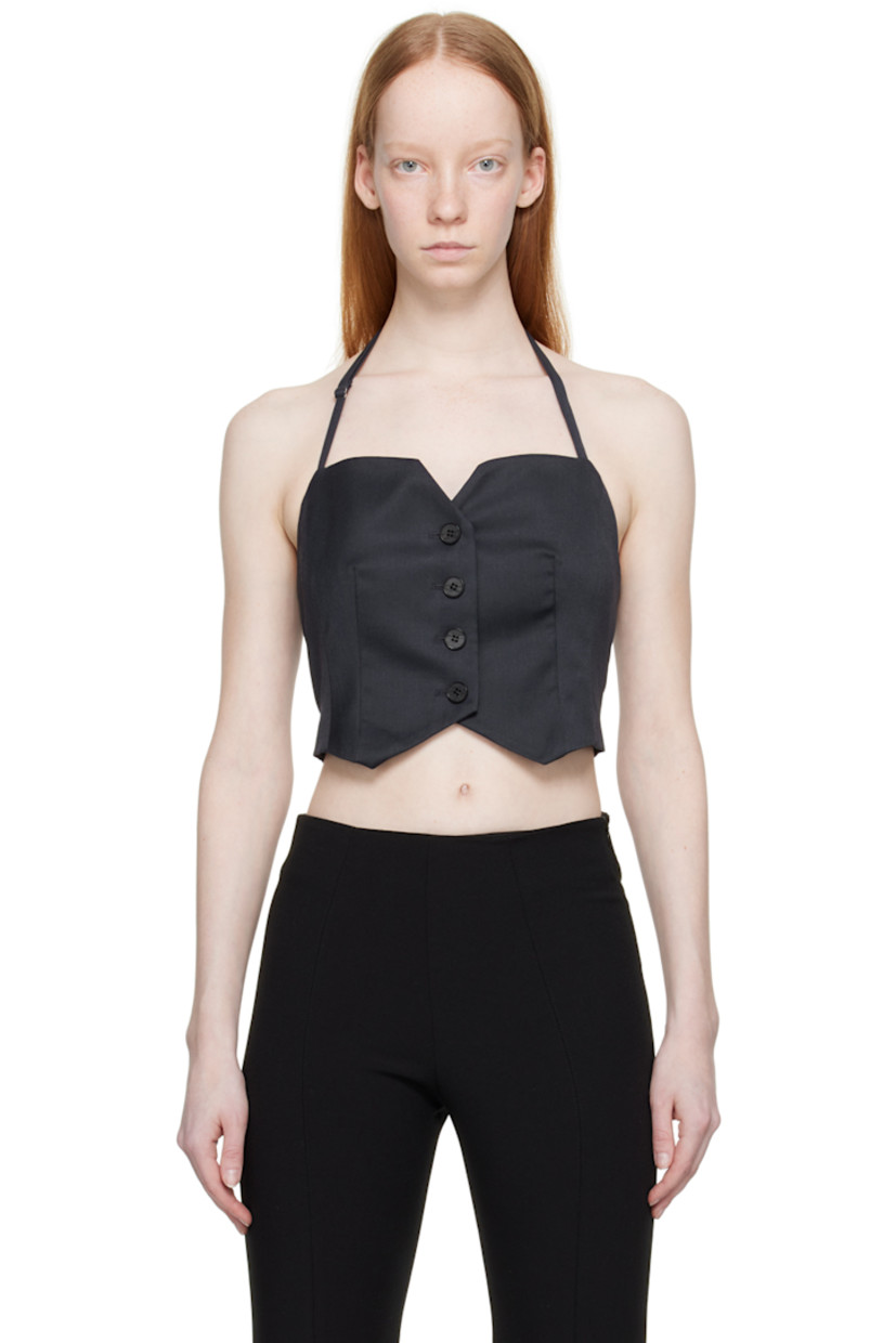 Wool-blend gabardine bustier-style tank top. 

· Adjustable halter strap
· Sweetheart neck 
· Button closure
· Darts at front and back 
· Asymmetric hem
· Elasticized jersey trim at low back 
· Partial viscose-blend satin lining

Supplier color: Navy