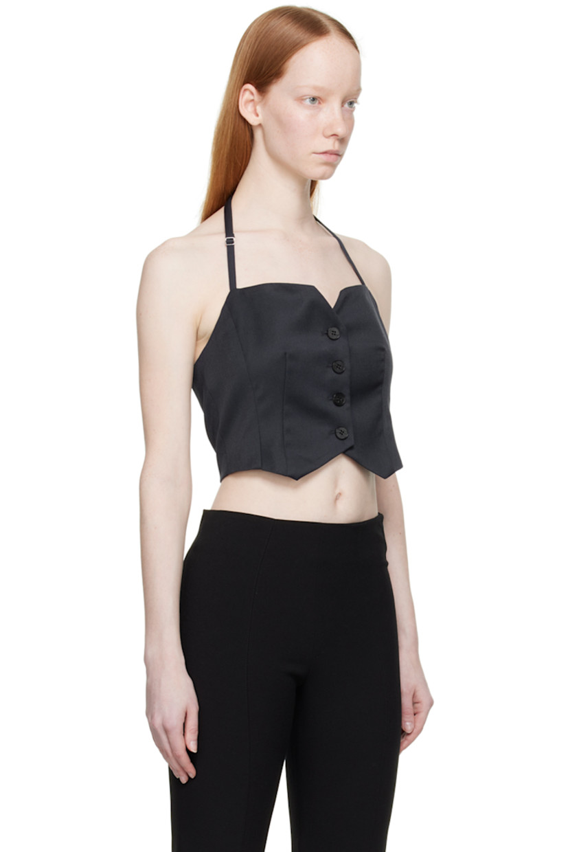Wool-blend gabardine bustier-style tank top. 

· Adjustable halter strap
· Sweetheart neck 
· Button closure
· Darts at front and back 
· Asymmetric hem
· Elasticized jersey trim at low back 
· Partial viscose-blend satin lining

Supplier color: Navy