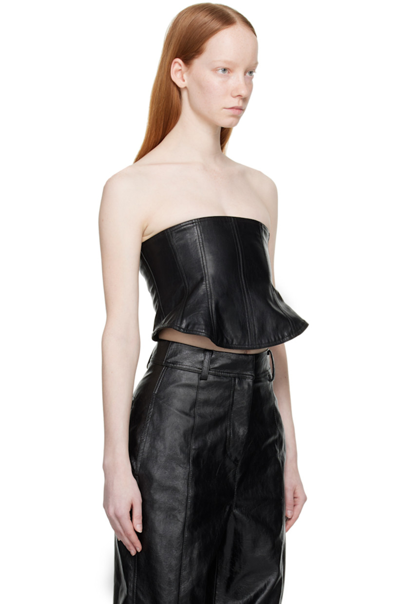Grained faux-leather corset. Boning throughout.

· Straight neck 
· Zip closure at side seam
· Criss-crossing self-tie closure at back 
· Full satin lining

Supplier color: Black