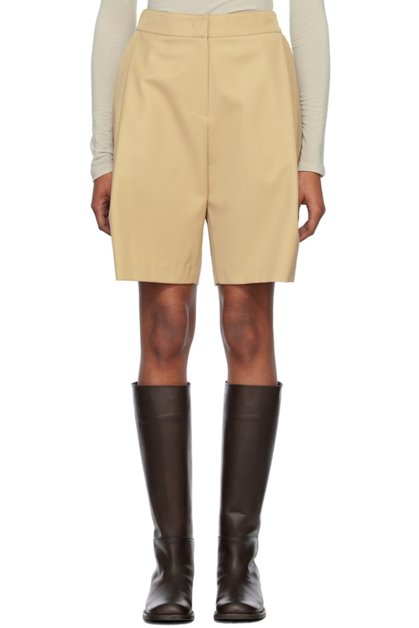 Wool-blend twill shorts.

· Partially elasticized waistband
· Four-pocket styling
· Zip-fly
· Pleats at front

Supplier color: Beige