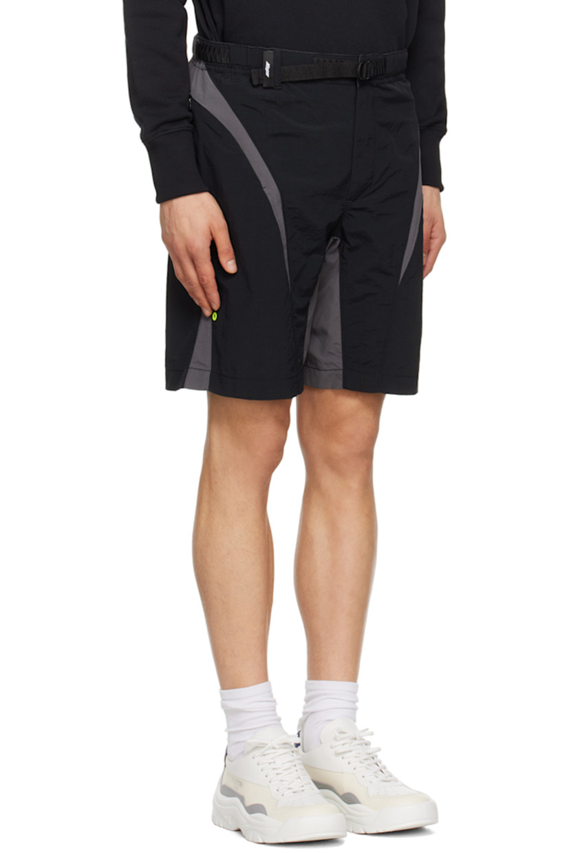 Nylon canvas shorts.

· Paneled construction
· Integrated cinch belt at elasticized waistband
· Belt loop at waistband
· Logo flag at waistband
· Two-pocket styling
· Zip-fly
· Eyelet vent at leg

Supplier color: Black