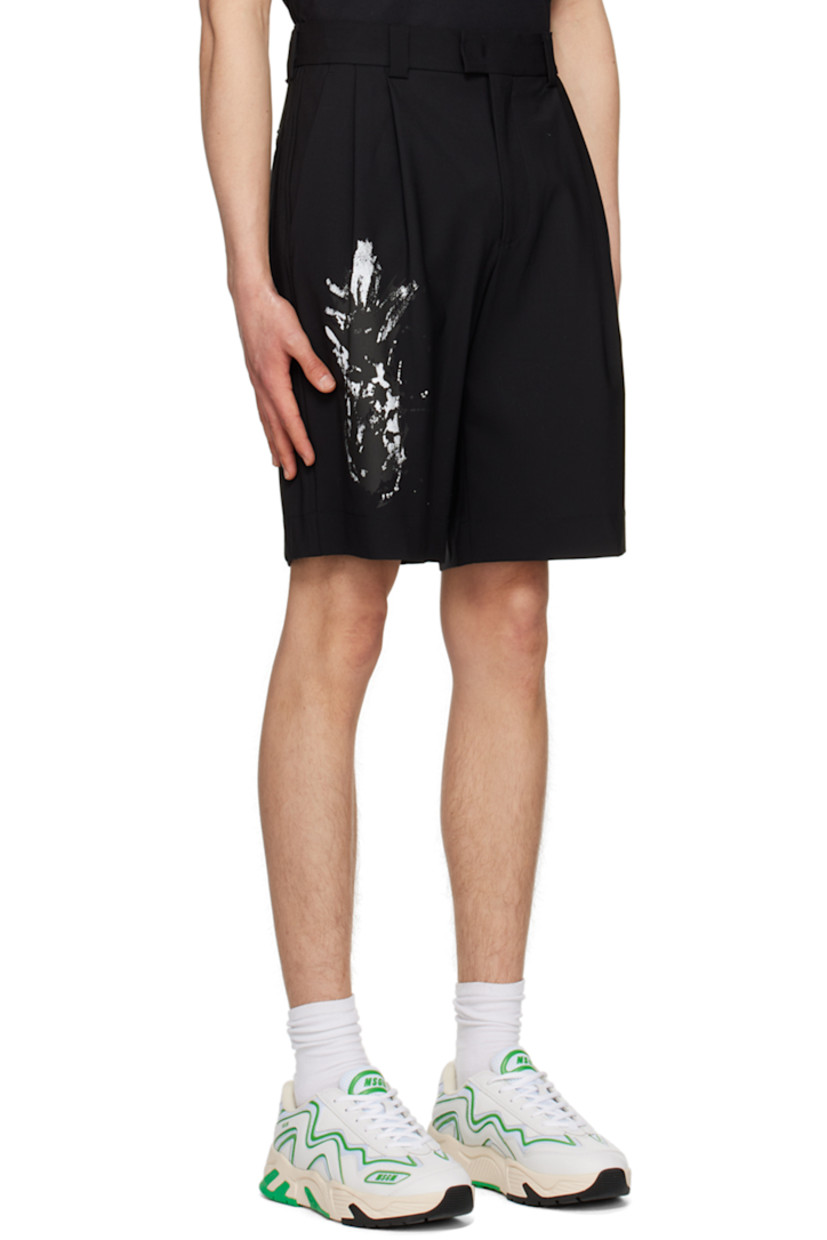 Lightweight plain-woven stretch wool shorts.

· Belt loops
· Four-pocket styling
· Zip-fly
· Pleats at waist
· Graphic printed at front and back
· Logo flag at back waistband

Supplier color: Black