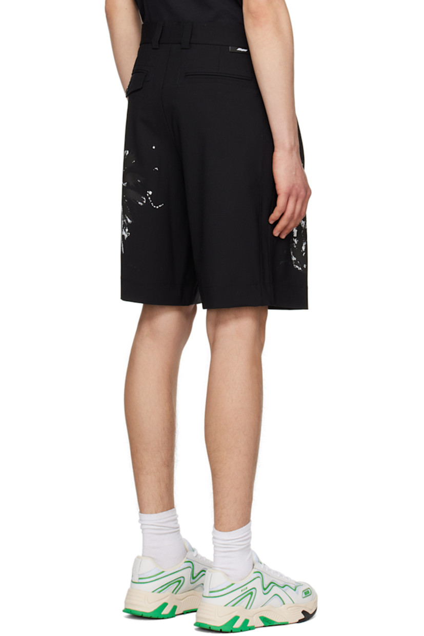 Lightweight plain-woven stretch wool shorts.

· Belt loops
· Four-pocket styling
· Zip-fly
· Pleats at waist
· Graphic printed at front and back
· Logo flag at back waistband

Supplier color: Black