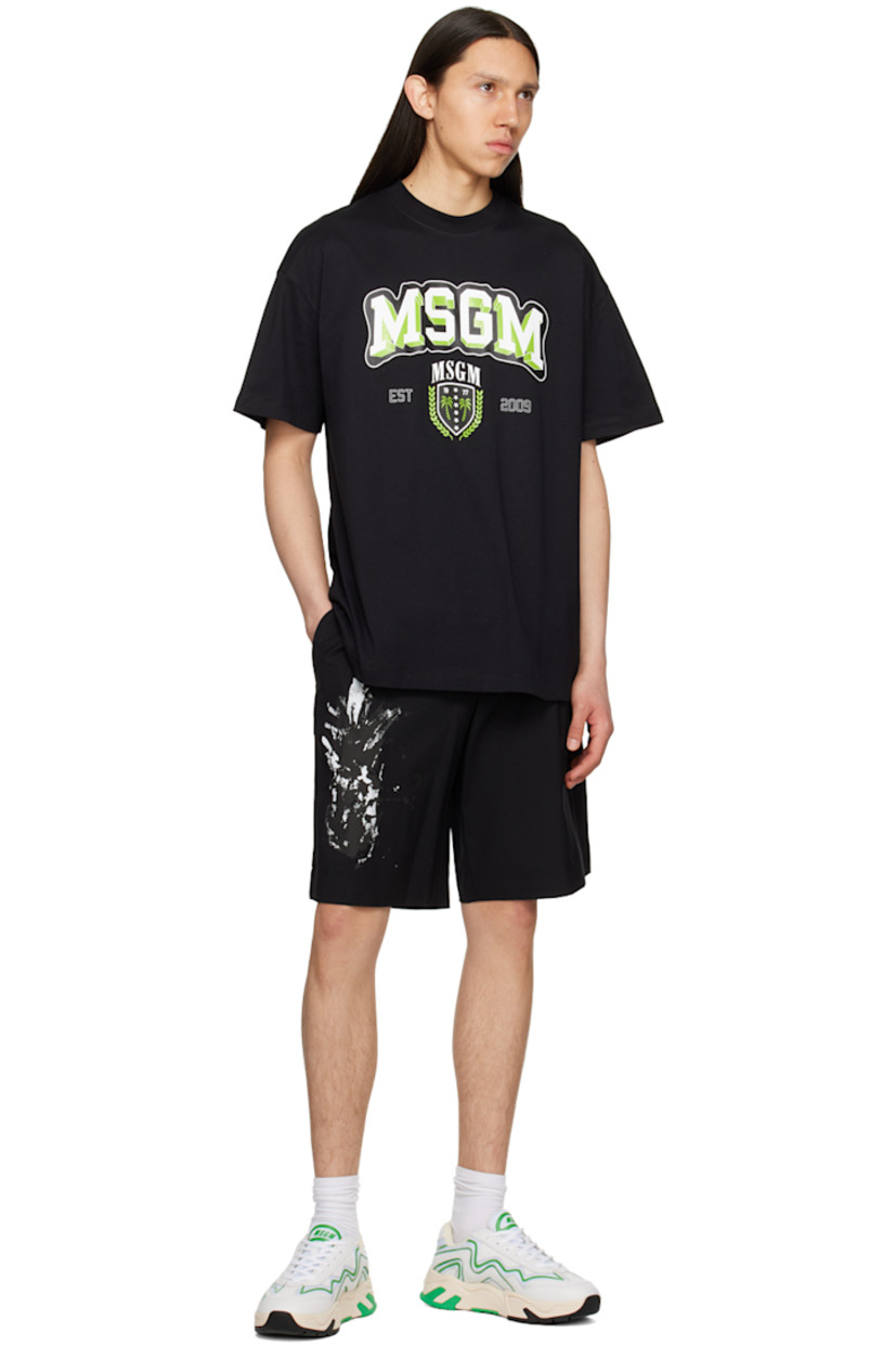 Lightweight plain-woven stretch wool shorts.

· Belt loops
· Four-pocket styling
· Zip-fly
· Pleats at waist
· Graphic printed at front and back
· Logo flag at back waistband

Supplier color: Black