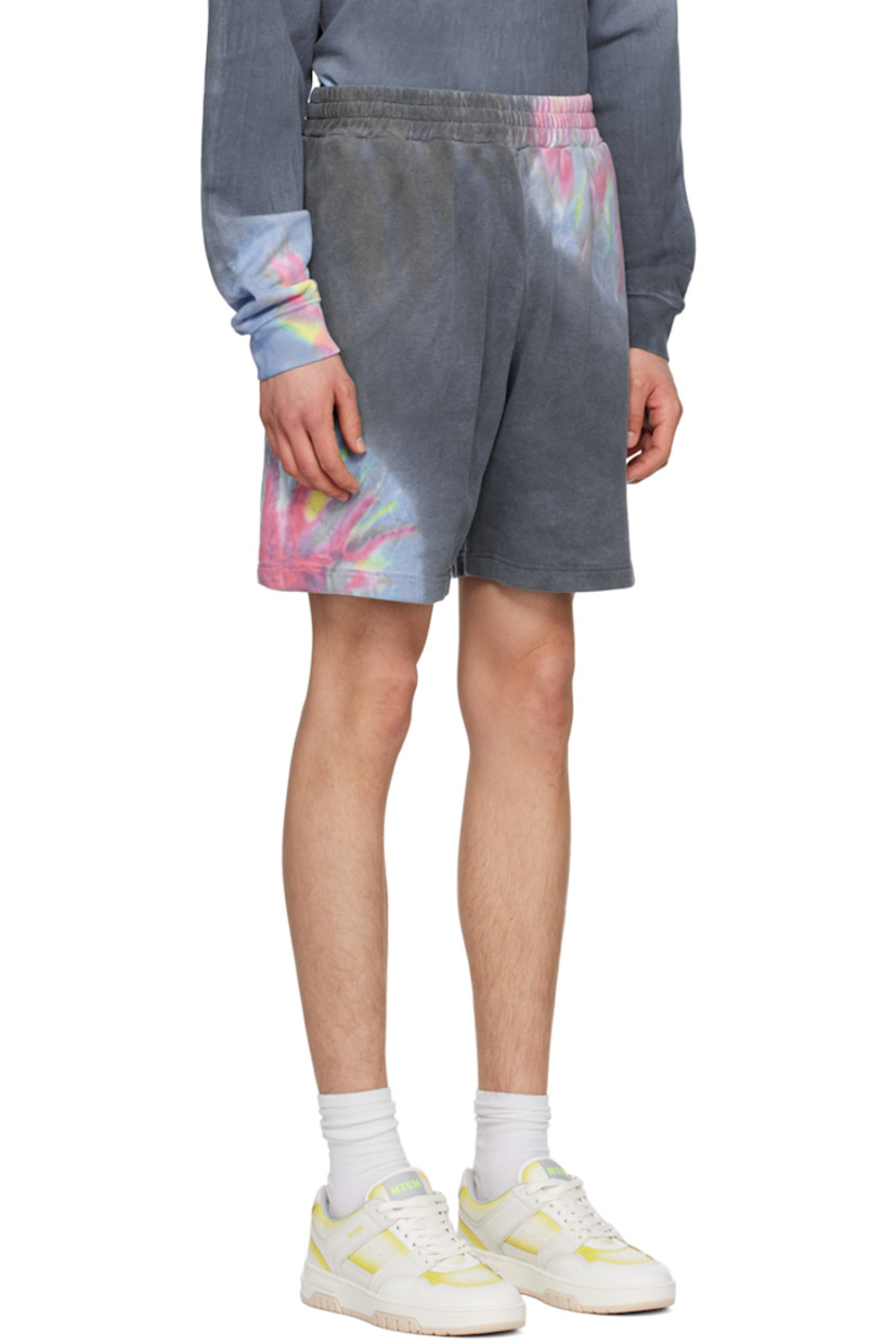 French terry shorts. Tie-dyed pattern printed throughout. 

· Drawstring at elasticized waistband
· Three-pocket styling
· Logo printed at front

Supplier color: Multicolor