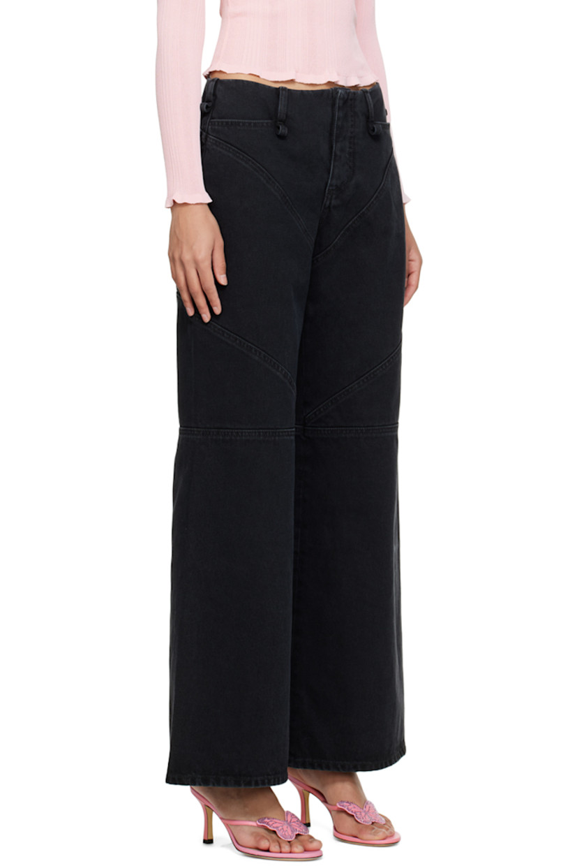 Non-stretch denim jeans. Fading throughout. 

· High-rise 
· Belt loops 
· Three-pocket styling 
· Button-fly 
· Darts at front and back 
· Flared cuffs 

Supplier color: Black