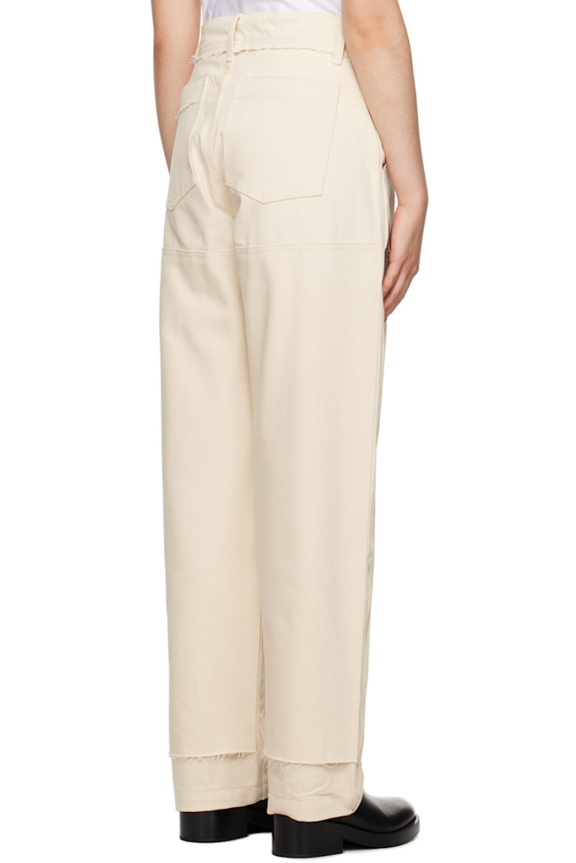Cotton drill trousers. Raw edges throughout.

· Paneled construction
· Belt loops
· Four-pocket styling
· Button-fly
· Gauze panel at front legs
· Logo embroidered at back

Supplier color: Natural