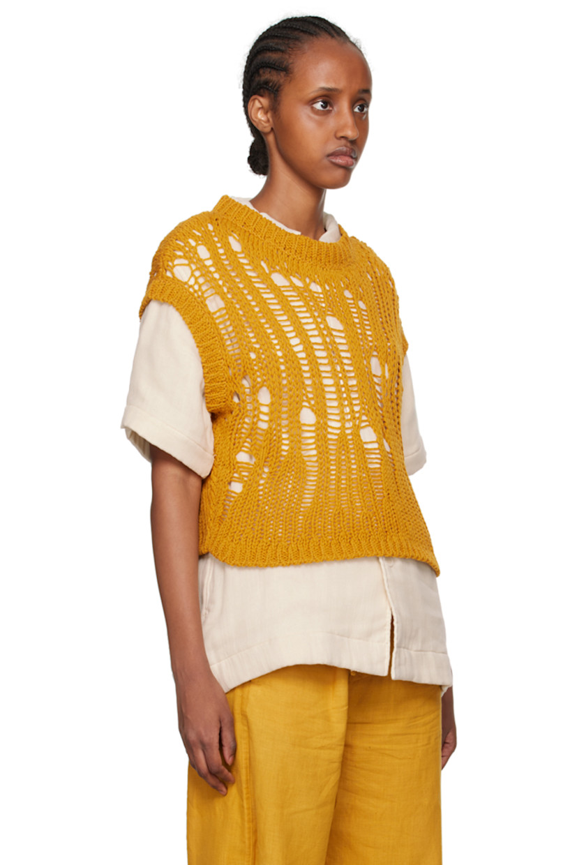 Open knit recycled cashmere- and wool-blend vest.

· Laddering throughout
· Rib knit crewneck, hem, and armscyes

Supplier color: Saffron