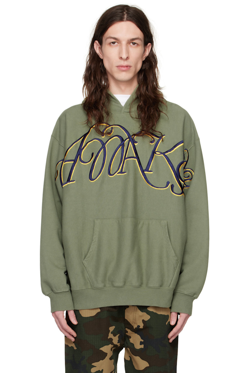 French terry hoodie.

· Logo graphic embroidered at front
· Kangaroo pocket
· Rib knit hem and cuffs

Supplier color: Sage