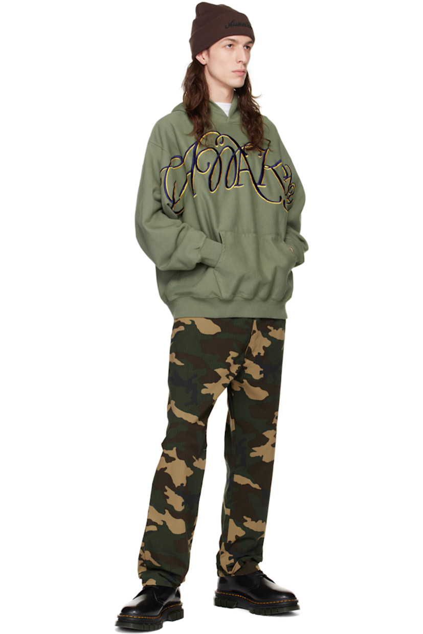 French terry hoodie.

· Logo graphic embroidered at front
· Kangaroo pocket
· Rib knit hem and cuffs

Supplier color: Sage