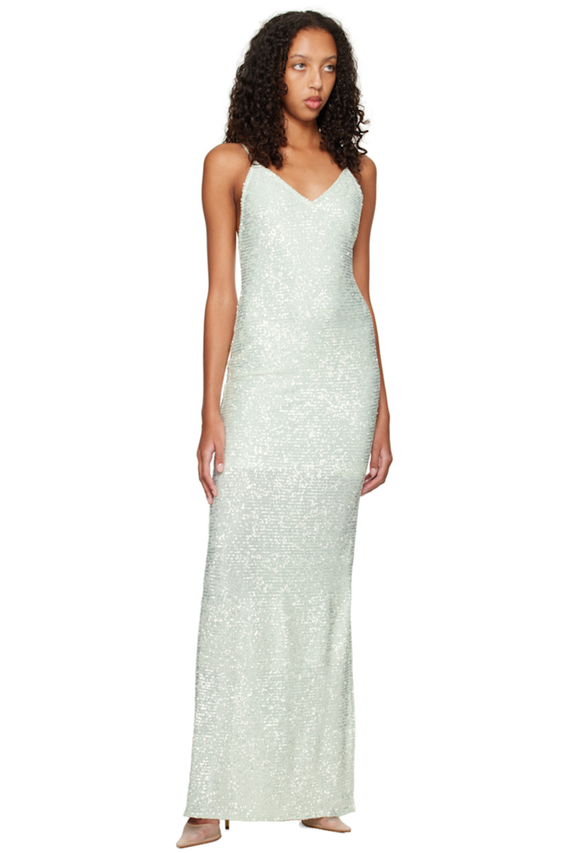 Sequinned stretch nylon mesh dress. 

· V-neck
· Concealed zip closure at side seam
· Fixed spaghetti straps
· Central vent at back hem
· Partial stretch jersey lining 

Supplier color: Water green