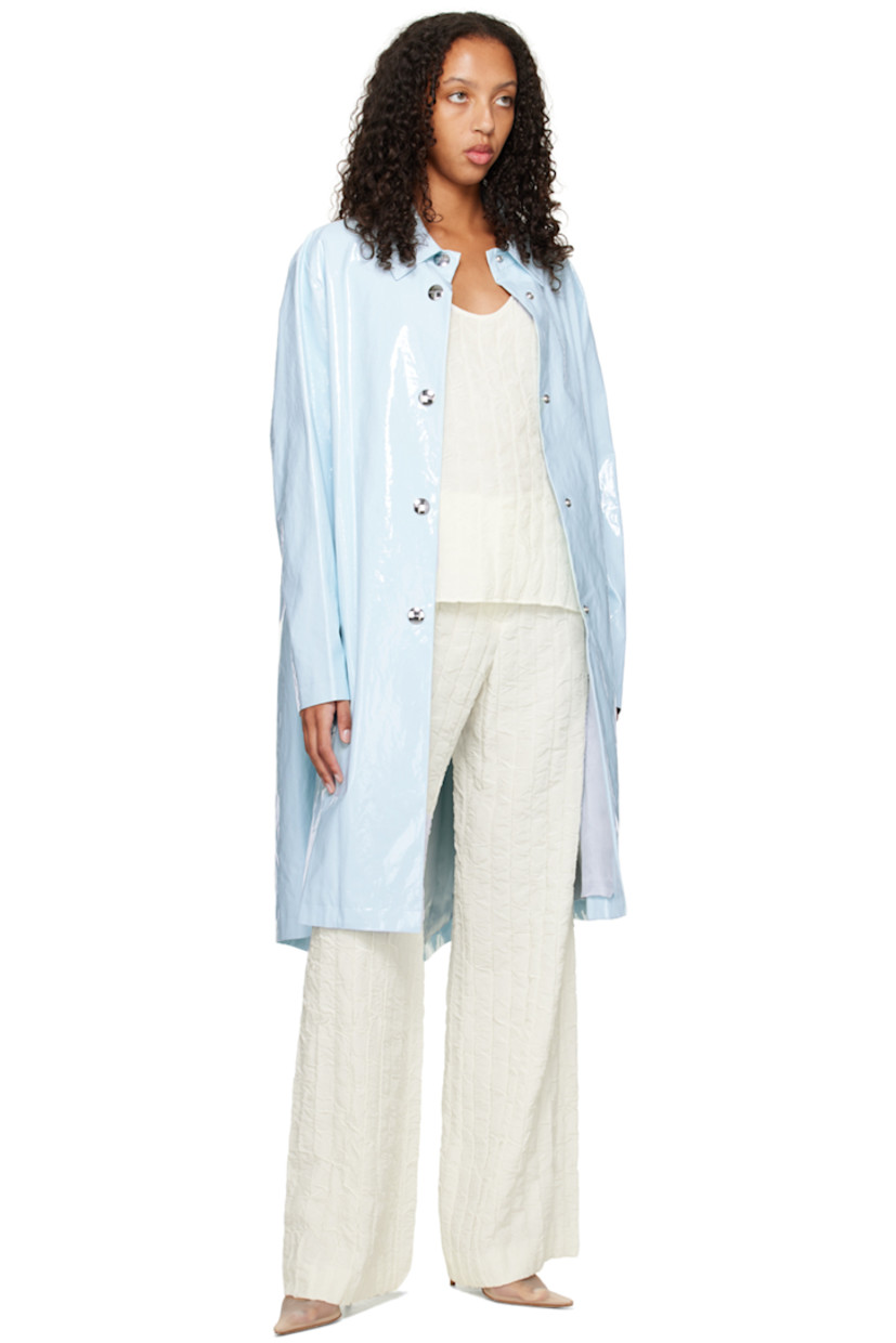 Polyurethane-coated cotton canvas coat. 

· Spread collar
· Press-stud closure
· Welt pockets
· Full viscose twill lining
· Logo-engraved silver-tone hardware 

Supplier color: Sky blue