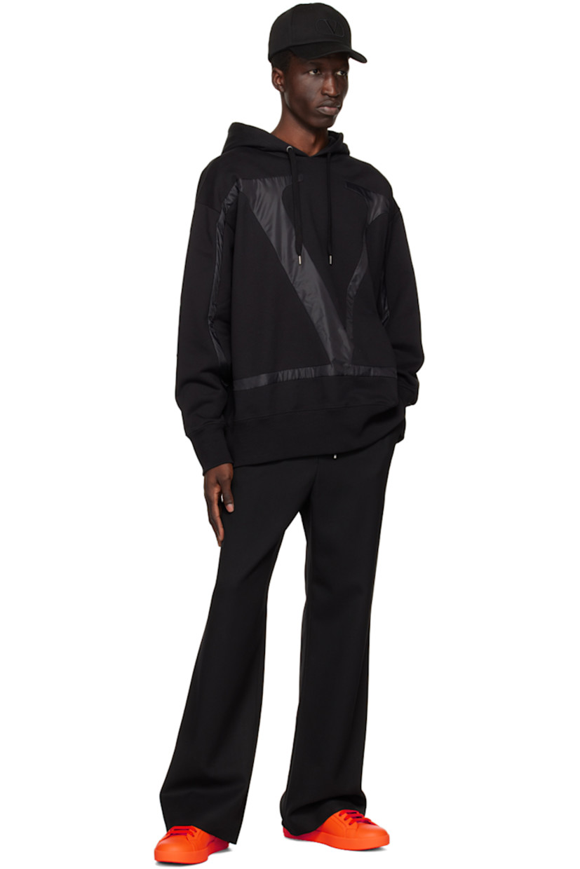 French terry hoodie. Taffeta logo appliqué throughout. 

· Paneled construction
· Drawstring at hood
· Rib knit hem and cuffs
· Dropped shoulders

Supplier color: Nero