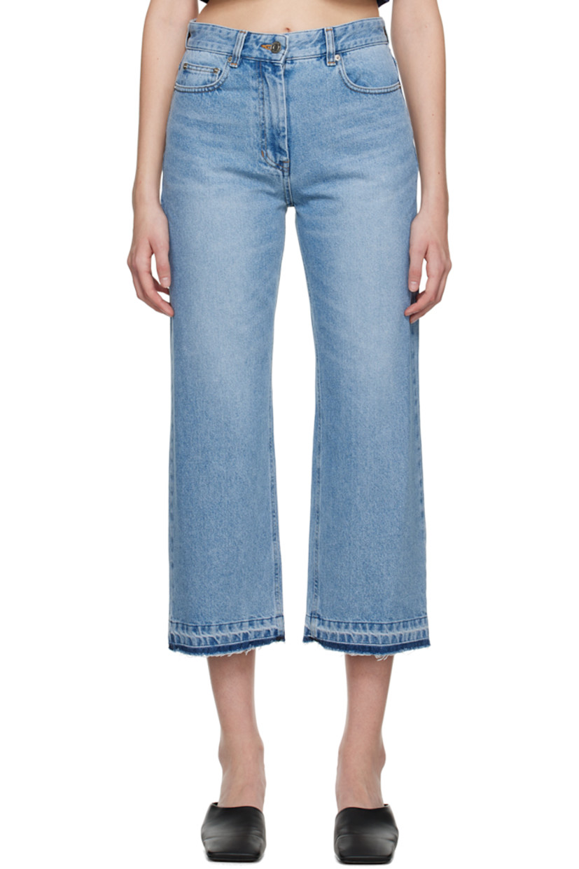 Non-stretch denim jeans. Fading and whiskering throughout.

· Belt loops
· Five-pocket styling
· Zip-fly
· Raw edge at cuffs
· Leather logo patch at back waistband
· Logo-engraved silver-tone hardware
· Contrast stitching in tan

Supplier color: Smoke blue