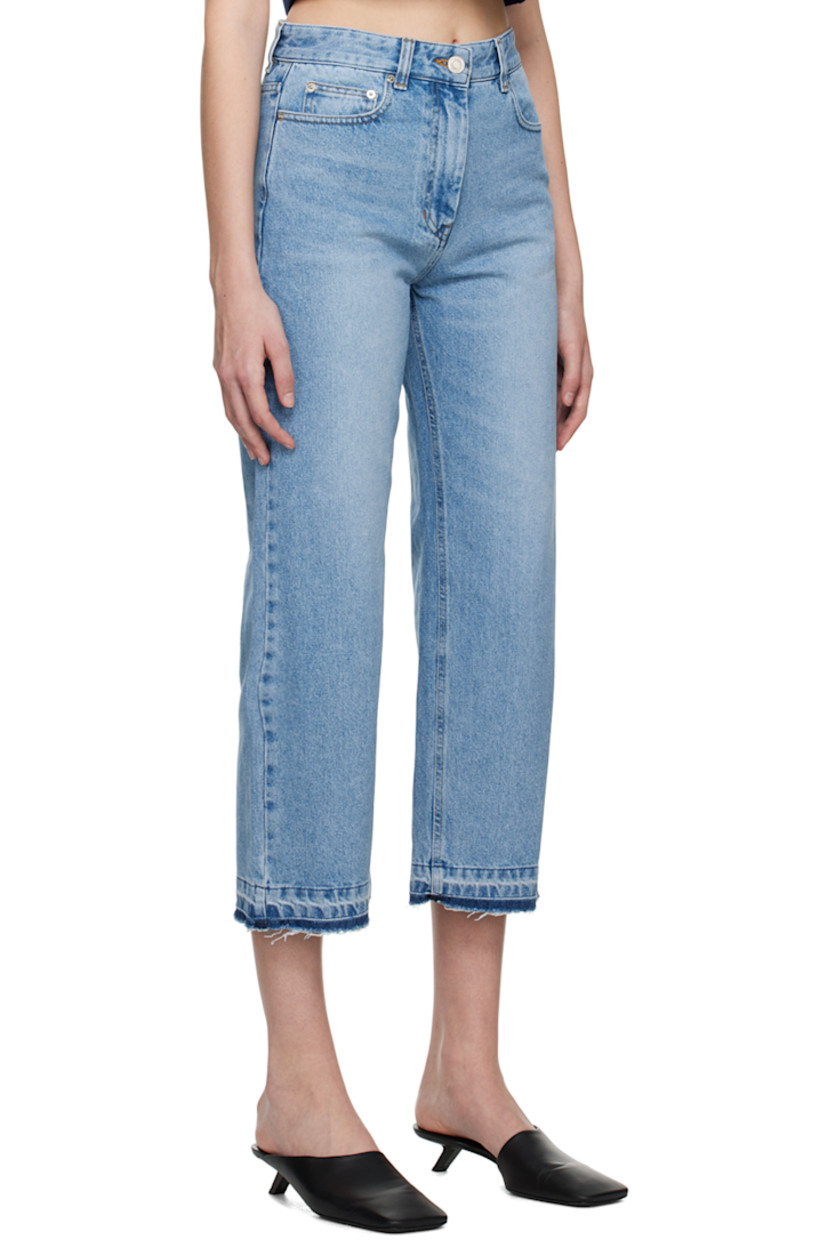 Non-stretch denim jeans. Fading and whiskering throughout.

· Belt loops
· Five-pocket styling
· Zip-fly
· Raw edge at cuffs
· Leather logo patch at back waistband
· Logo-engraved silver-tone hardware
· Contrast stitching in tan

Supplier color: Smoke blue
