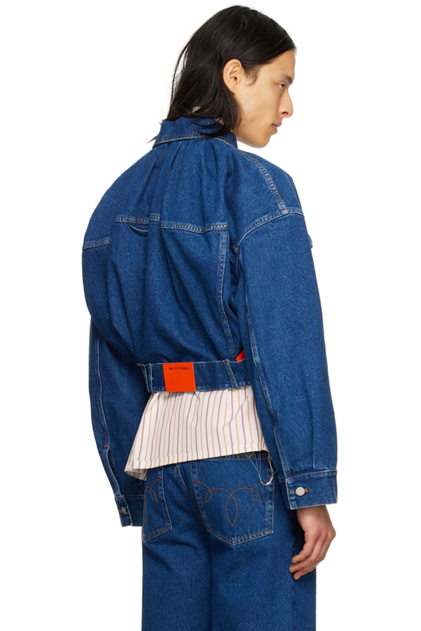 Non-stretch denim jacket. Fading throughout.

· Paneled construction
· Spread collar
· Button closure
· Graphic pattern embroidered at chest
· Flap pockets and welt pockets
· Detachable self-tie belt at cropped hem
· Dropped shoulders
· Single-button barrel cuffs
· Gathering at back collar
· Locker loop at back yoke
· Patent leather logo patches at back hem

Supplier color: Blue