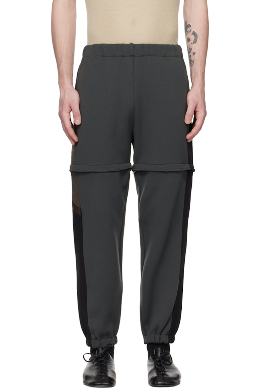 Knit cotton- and acrylic-blend lounge pants. 

· Paneled construction
· Elasticized waistband and cuffs
· Two-pocket styling
· Zip fastening at detachable legs
· Jacquard graphic pattern at outseams
· Webbing trim at outseams

Supplier color: Dark patchwork