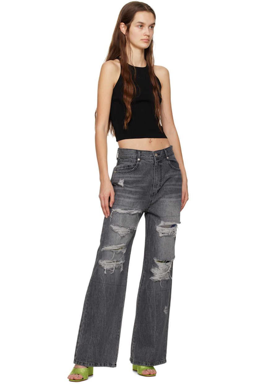 Non-stretch denim jeans. Fading, whiskering, and distressing throughout.

· Belt loops
· Five-pocket styling
· Zip-fly
· Mesh underlay at legs
· Logo plaque at back pocket
· Logo-engraved silver-tone hardware

Supplier color: Gray