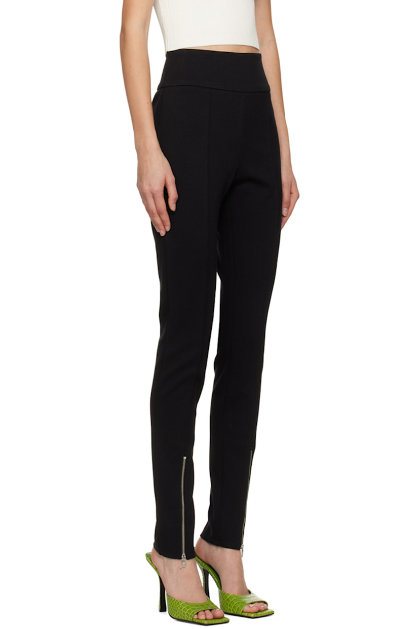 Double-faced stretch polyester and rayon-blend jersey trousers.

· Elasticized waistband
· Pinched seams
· Central zip vent at cuffs
· Zip closure at outseam

Supplier color: Black