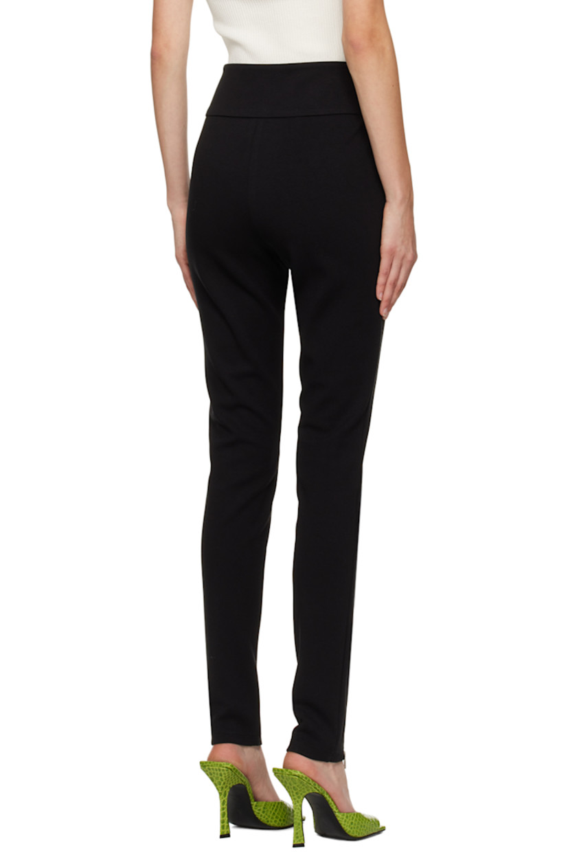 Double-faced stretch polyester and rayon-blend jersey trousers.

· Elasticized waistband
· Pinched seams
· Central zip vent at cuffs
· Zip closure at outseam

Supplier color: Black