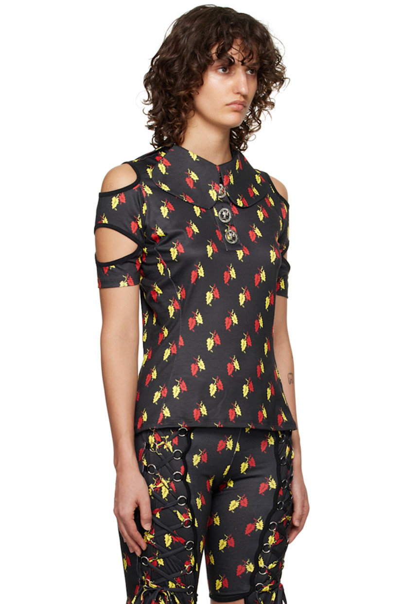 Stretch polyester jersey and organic cotton poplin polo. Graphic pattern printed throughout.

· Modified Peter Pan collar
· Graphic hardware at three-button placket
· Cutouts at sleeves
· Rib knit cuffs
· Logo-engraved silver-tone hardware

Supplier color: Black/Multi
