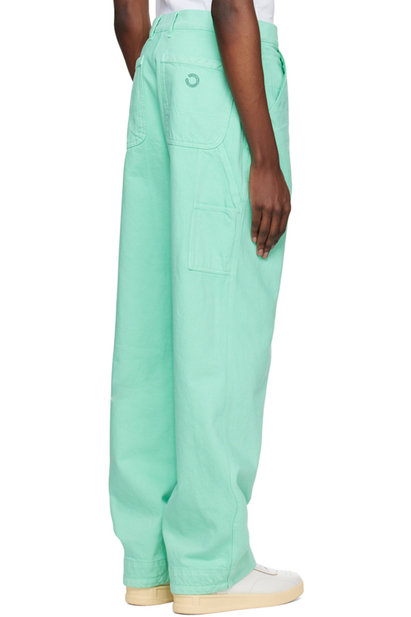 Loose-fit garment-dyed non-stretch deadstock cotton denim jeans. 

· Belt loops
· Five-pocket styling
· Zip-fly
· Hand-stamped logo at hammer loop and back pocket
· Patch pockets at outseam

Supplier color: Arsham green