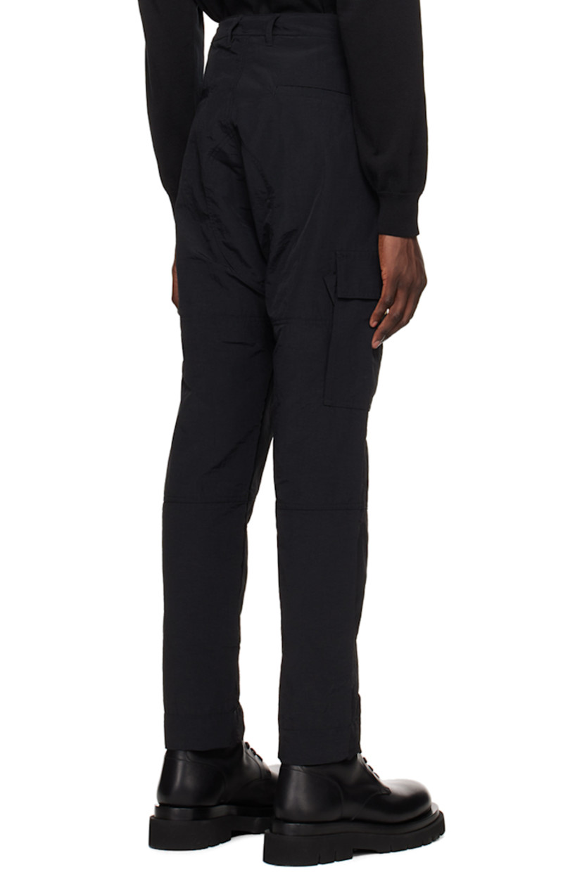 Slim-fit nylon faille cargo pants. 

· Concealed drawstring and belt loops at waistband
· Four-pocket styling
· Zip-fly
· Logo embroidered at leg
· Drawstring at cuffs
· Patch pocket at outseams

Supplier color: Black/White