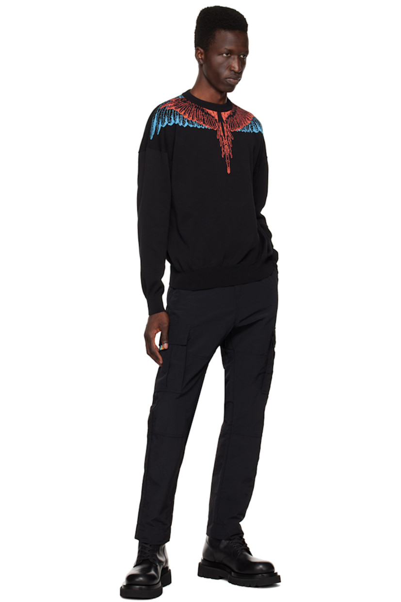 Slim-fit nylon faille cargo pants. 

· Concealed drawstring and belt loops at waistband
· Four-pocket styling
· Zip-fly
· Logo embroidered at leg
· Drawstring at cuffs
· Patch pocket at outseams

Supplier color: Black/White