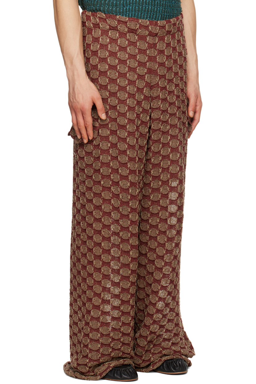 Semi-sheer hand-knit stretch rayon trousers. Check pattern throughout. 

· Elasticized waistband
· Flap pocket at outseams
· Shorts-style lining

Available exclusively at SSENSE.

Supplier color: Potato