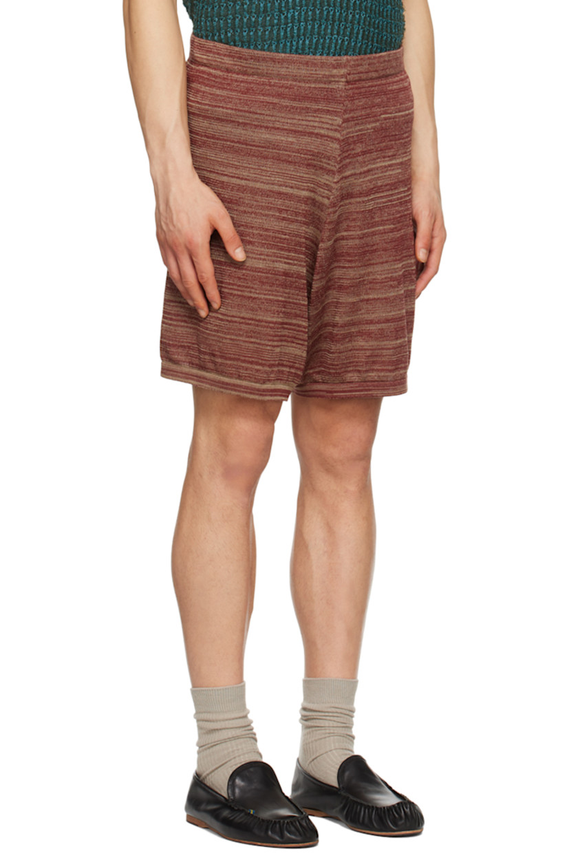 Semi-sheer hand-knit stretch rayon trousers. Check pattern throughout. 

· Elasticized waistband
· Flap pocket at outseams
· Shorts-style lining

Available exclusively at SSENSE.

Supplier color: Potato