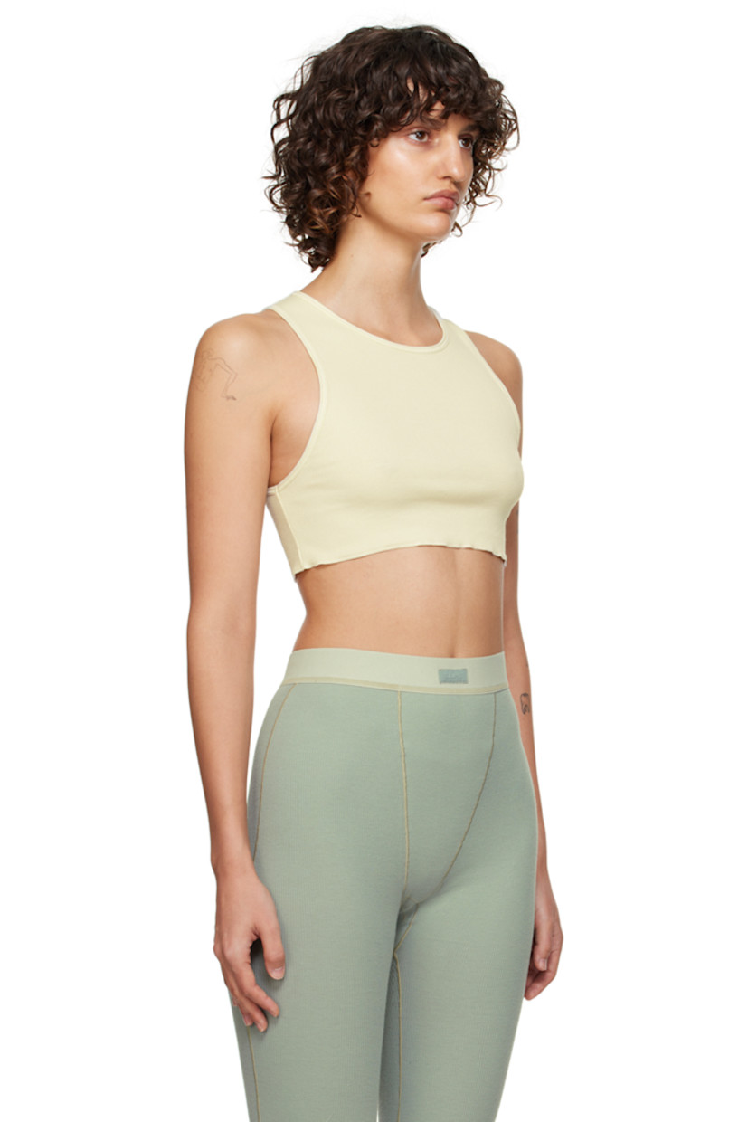 Stretch rib knit cotton tank top. Scoop neck.

Supplier color: Bone