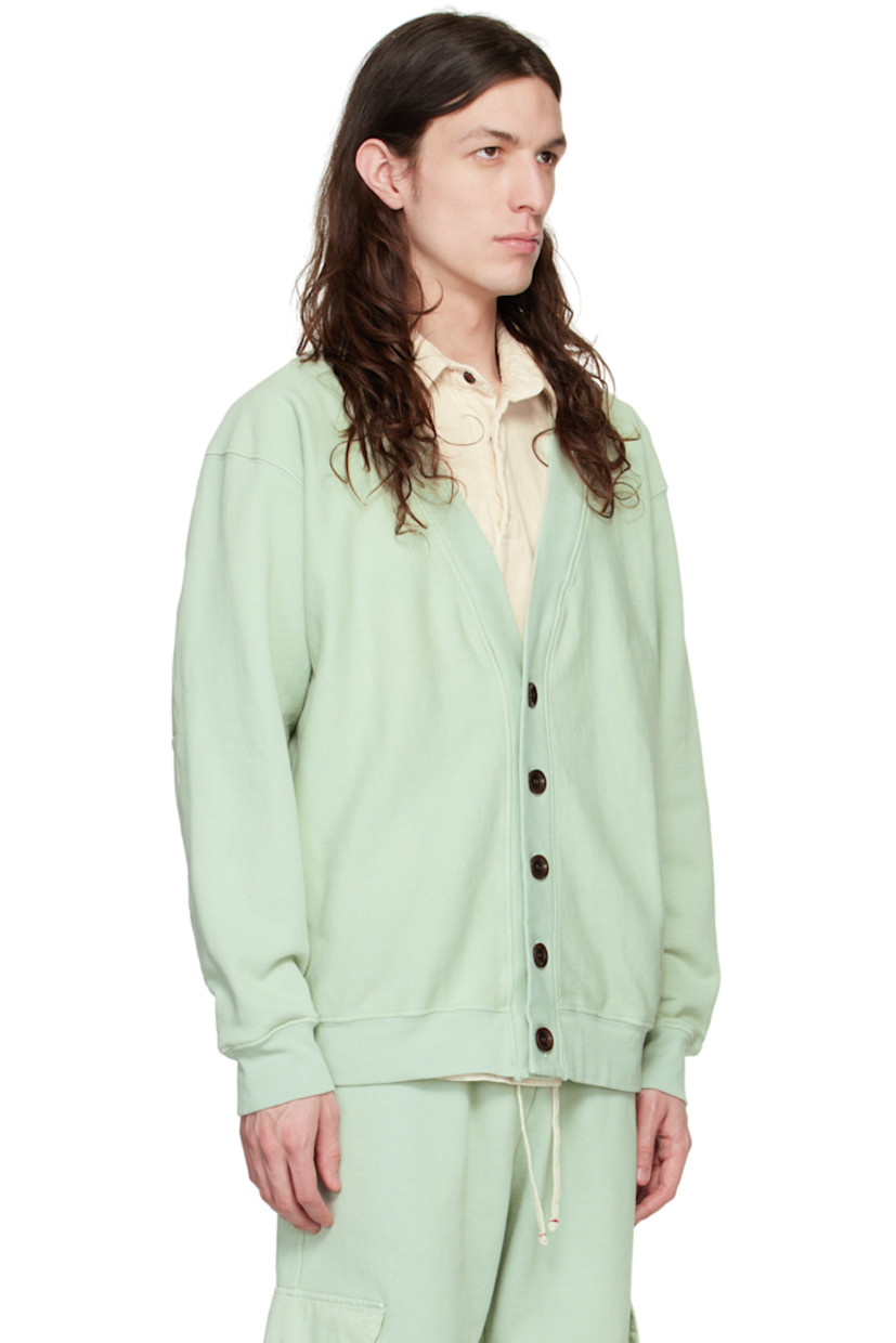 Garment-dyed organic cotton French terry cardigan.

· Y-neck
· Button closure
· Rib knit hem and cuffs
· Corozo hardware

Supplier color: Mint chip