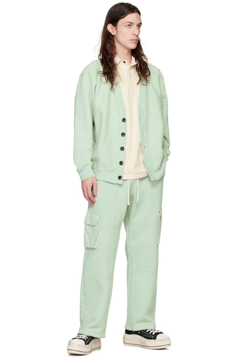 Garment-dyed organic cotton French terry cardigan.

· Y-neck
· Button closure
· Rib knit hem and cuffs
· Corozo hardware

Supplier color: Mint chip