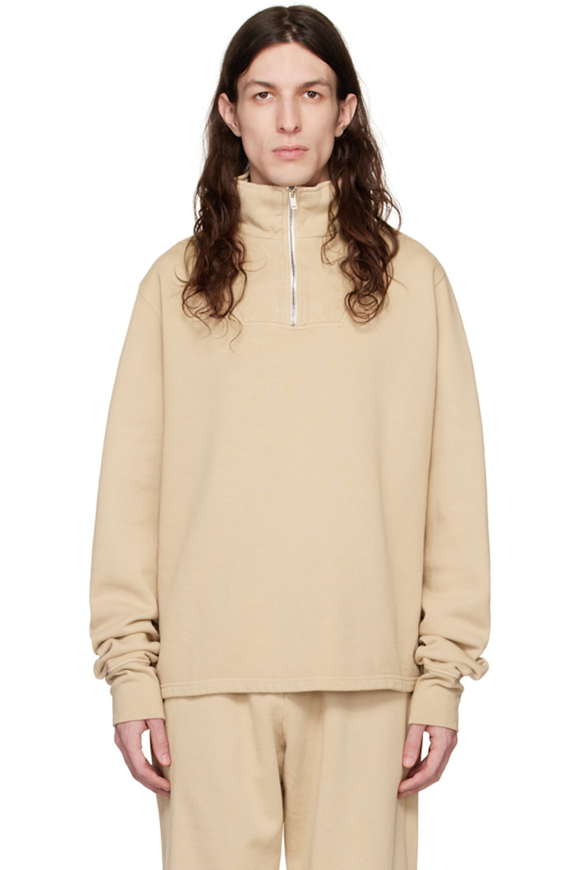 Garment-dyed heavyweight cotton fleece sweater. Pre-shrunk.

· Rib knit stand collar and cuffs
· Half-zip closure

Supplier color: Almond