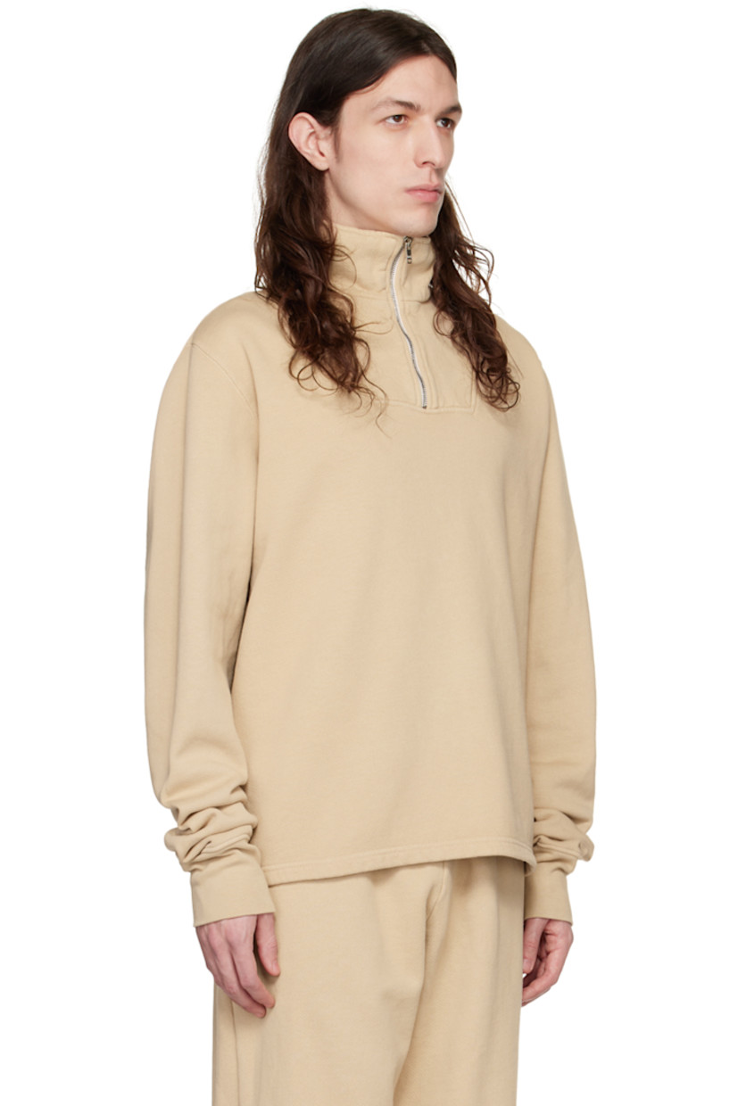 Garment-dyed heavyweight cotton fleece sweater. Pre-shrunk.

· Rib knit stand collar and cuffs
· Half-zip closure

Supplier color: Almond