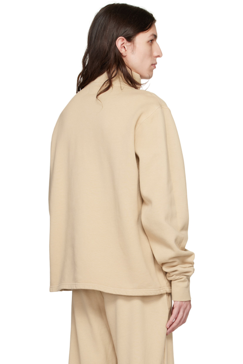 Garment-dyed heavyweight cotton fleece sweater. Pre-shrunk.

· Rib knit stand collar and cuffs
· Half-zip closure

Supplier color: Almond