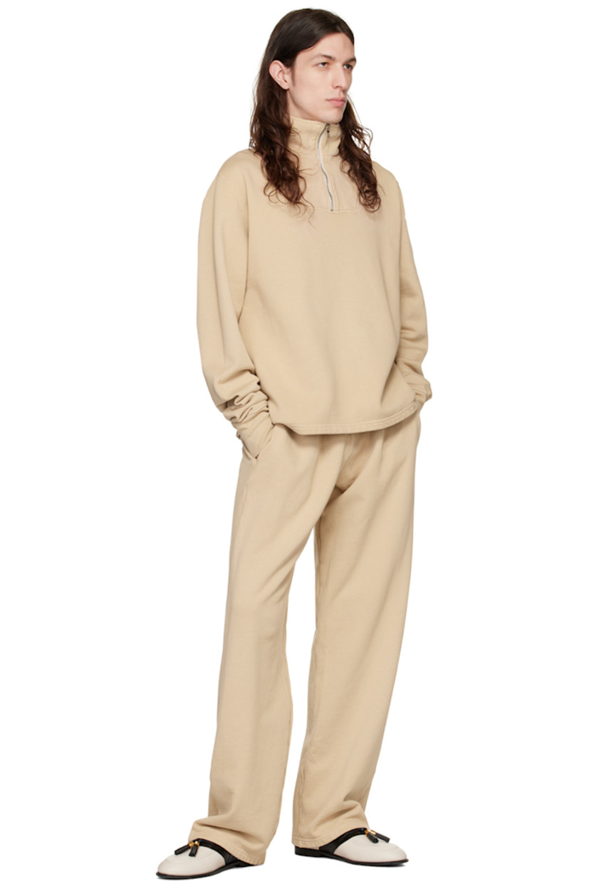 Garment-dyed heavyweight cotton fleece sweater. Pre-shrunk.

· Rib knit stand collar and cuffs
· Half-zip closure

Supplier color: Almond