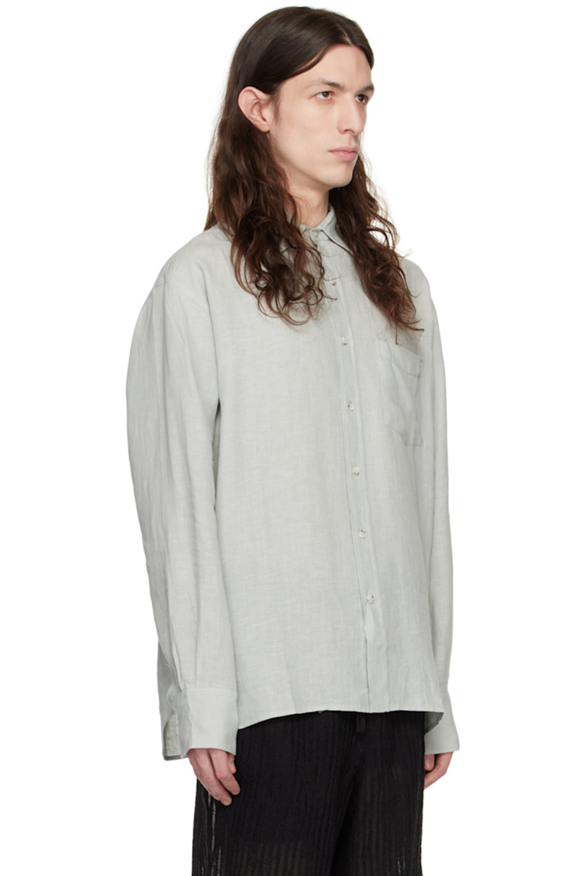 Linen gauze shirt.

· Spread collar
· Button closure
· Patch pocket at chest
· Shirttail hem
· Single-button barrel cuffs
· Box pleat at back yoke

Supplier color: Pistachio