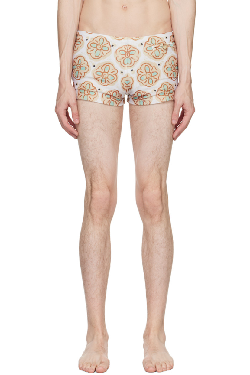 Stretch recycled polyester jersey swim briefs. Graphic pattern printed throughout.

· Concealed drawstring at waistband
· Single-pocket styling
· Full jersey lining

Supplier color: Beige/Pistachio
